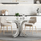 Tavolo da pranzo rotondo con piano in vetro