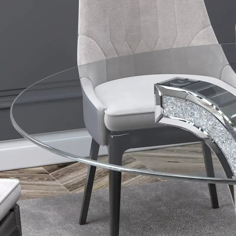 Tavolo da pranzo rotondo con piano in vetro