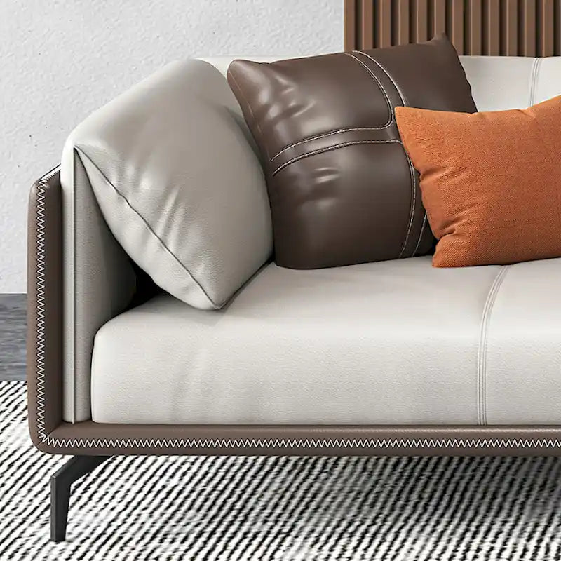 Divano con braccioli in ecopelle e imbottitura pillow top, cuscini reversibili - tre posti